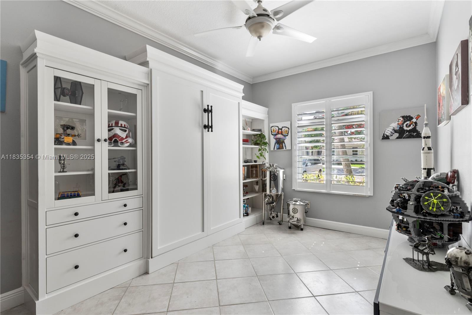 12530 Southwest 96th Court Miami, FL 33176 - Photo 8 of 21 a view of room with cabinet and a large window