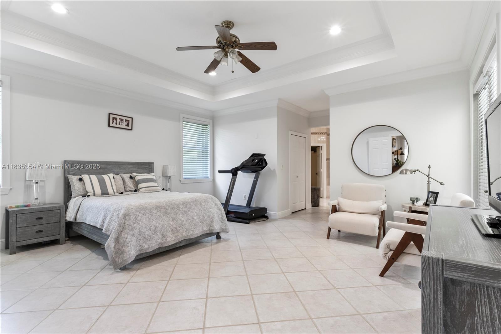 12530 Southwest 96th Court Miami, FL 33176 - Photo 10 of 21 a bedroom with bed and a chandelier