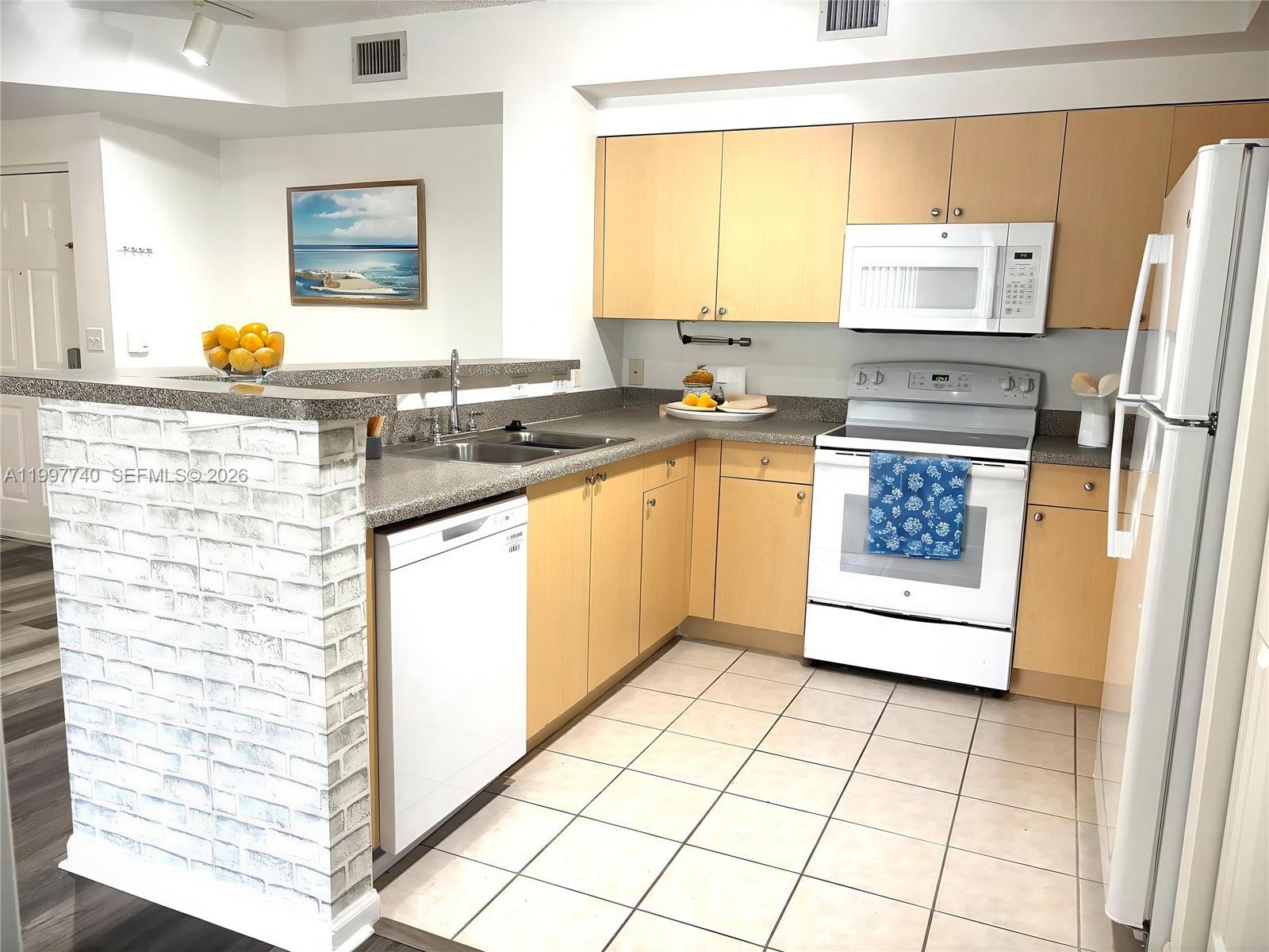 8050 North Nob Hill Road, Unit 105 Tamarac, FL 33321 - Photo 6 of 13 Virtually Staged