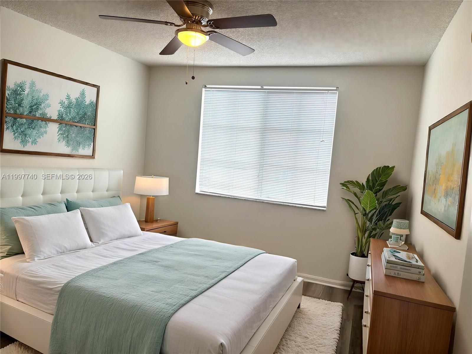 8050 North Nob Hill Road, Unit 105 Tamarac, FL 33321 - Photo 7 of 13 Main Bedroom VirtuallyStaged