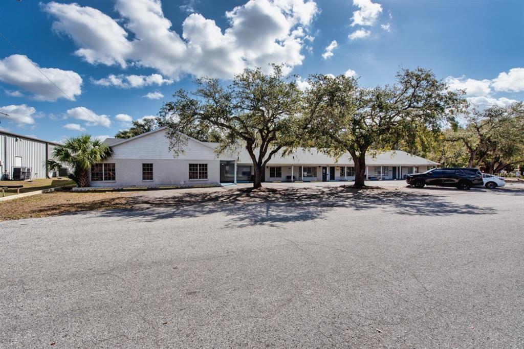 7410 Commerce Street, Unit 101 Riverview, FL 33578 - Photo 15 of 25 a view of a yard with a tree