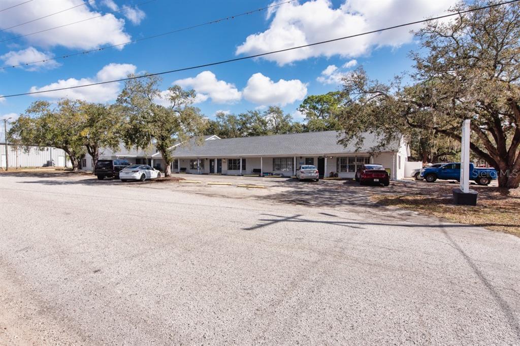 7410 Commerce Street, Unit 101 Riverview, FL 33578 - Photo 16 of 25 a view of house with a outdoor space