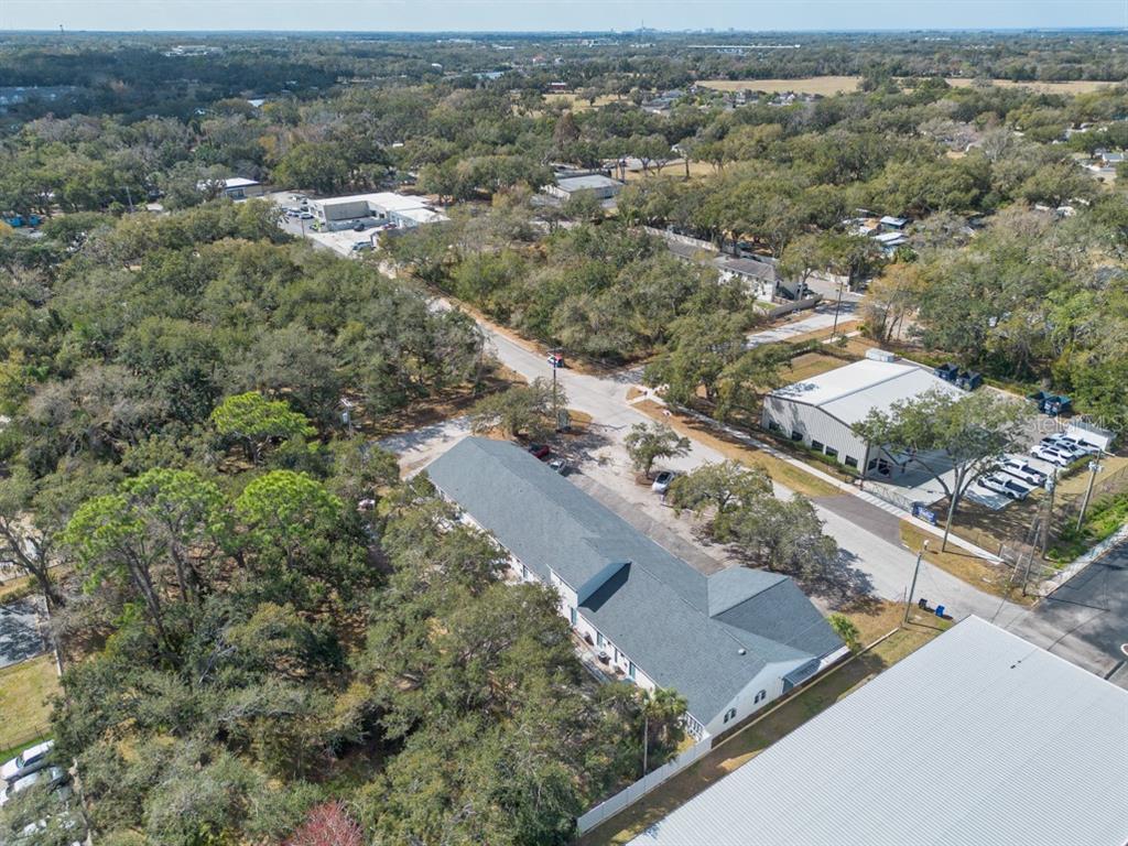 7410 Commerce Street, Unit 101 Riverview, FL 33578 - Photo 22 of 25 an aerial view of residential houses with outdoor space