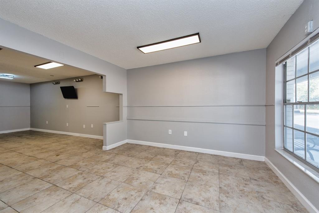 7410 Commerce Street, Unit 101 Riverview, FL 33578 - Photo 5 of 25 a view of empty room