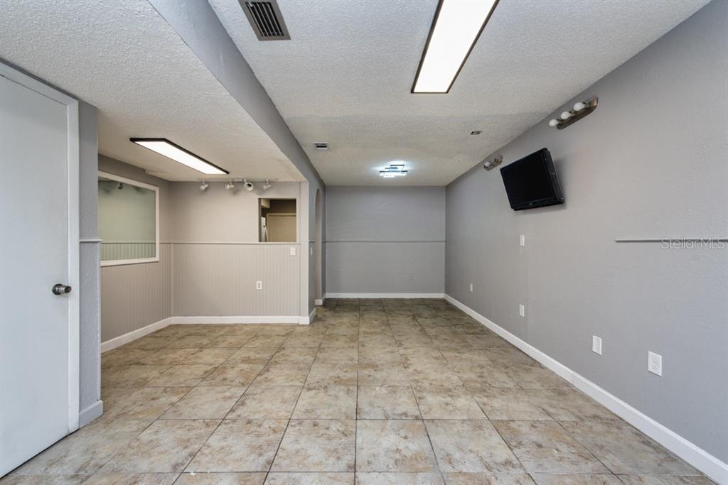 7410 Commerce Street, Unit 101 Riverview, FL 33578 - Photo 8 of 25 a view of an empty room
