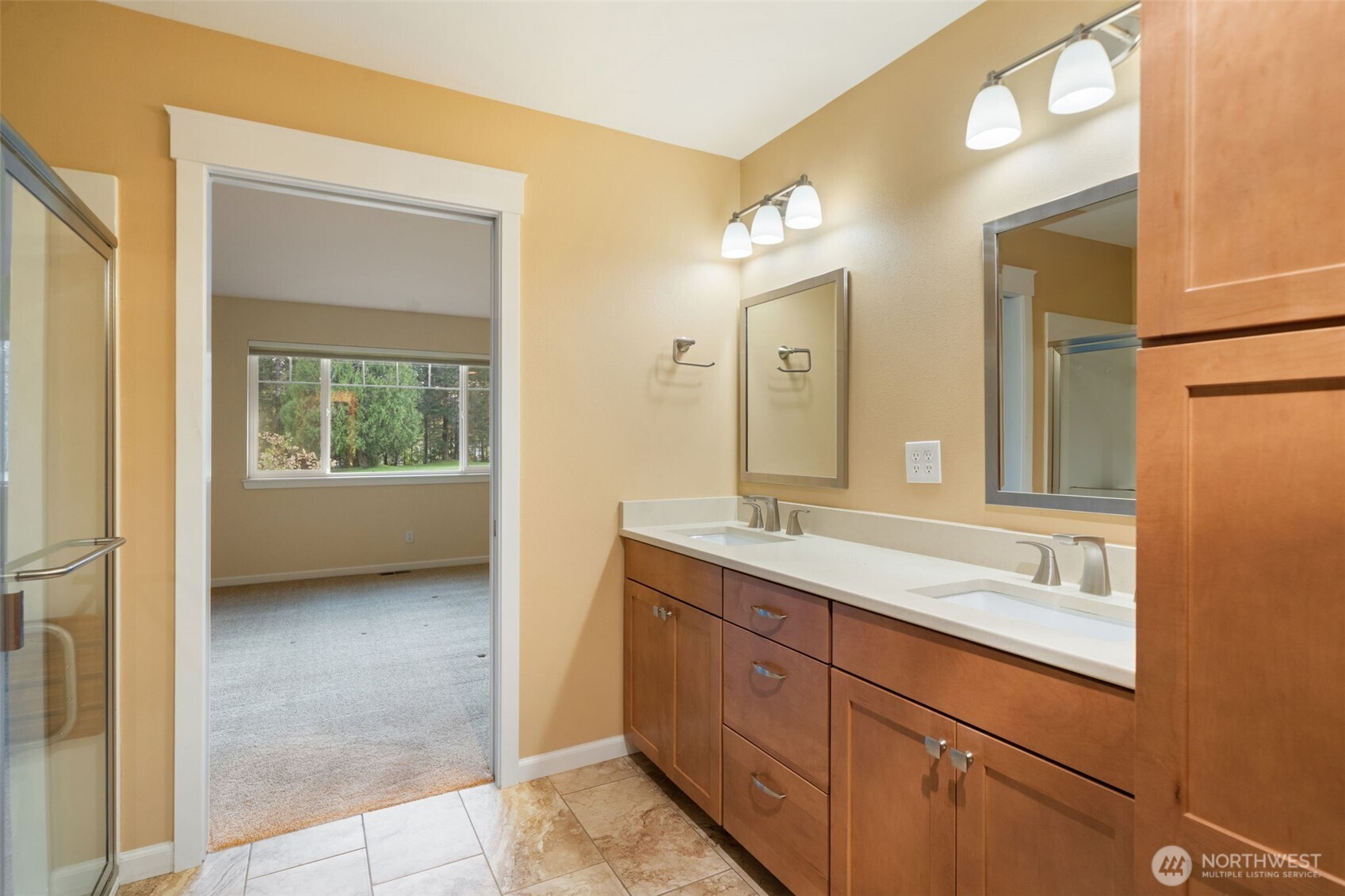 321 East Soderberg Road, Unit D12 Allyn, WA 98524 - Photo 25 of 37 a en suite bathroom with a granite countertop sink and a mirror