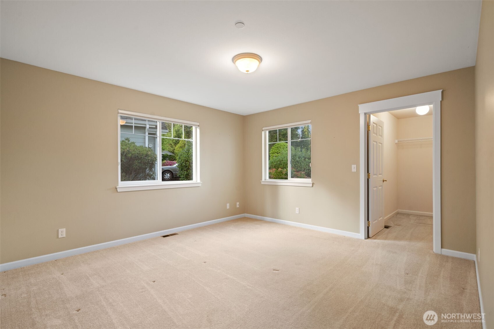 321 East Soderberg Road, Unit D12 Allyn, WA 98524 - Photo 28 of 37 an empty room with windows and closet