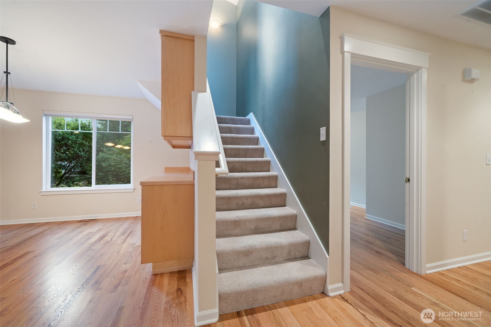 321 East Soderberg Road, Unit D12 Allyn, WA 98524 - Photo 30 of 37 a view of entryway and hall with wooden floor