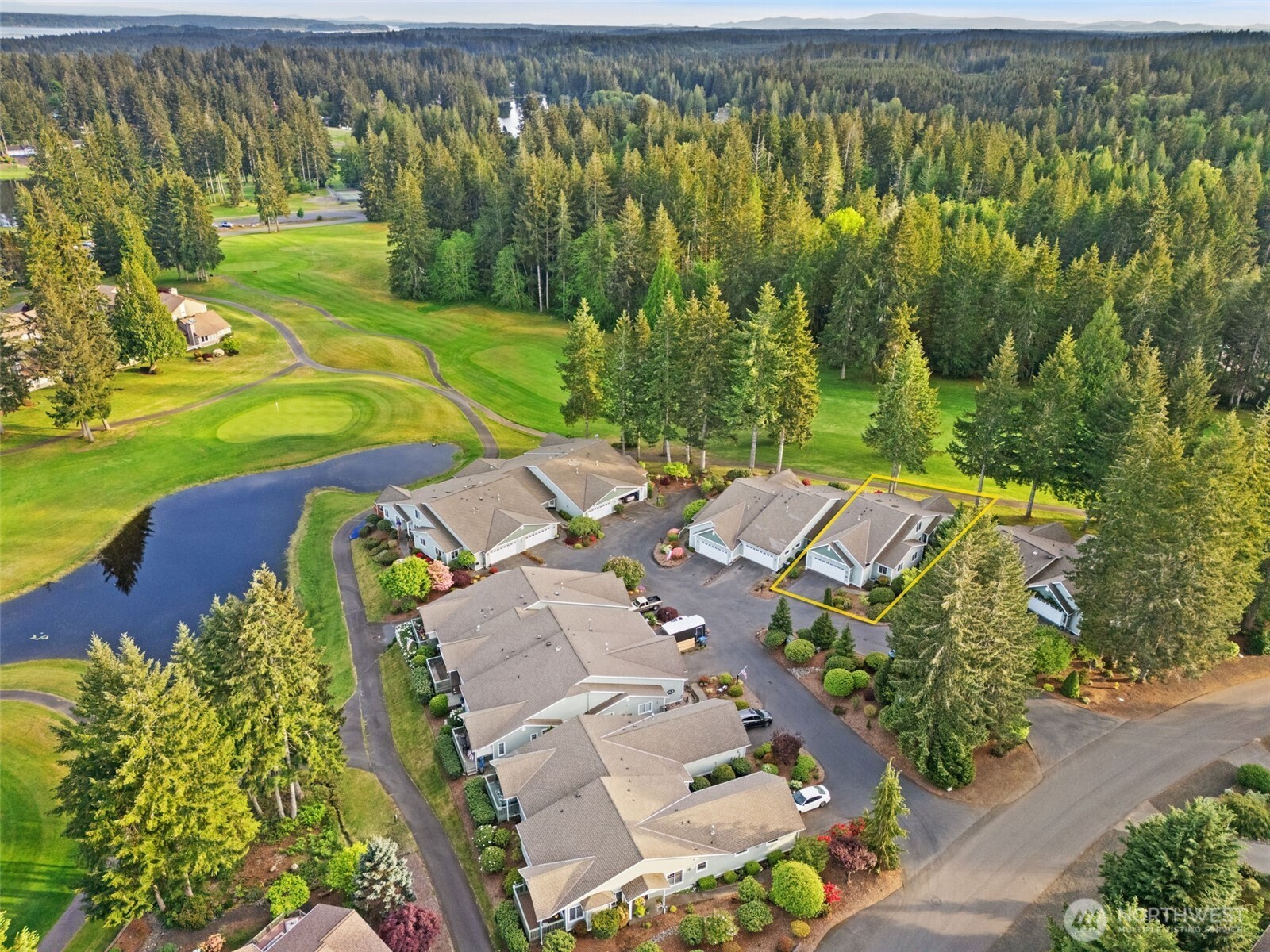 321 East Soderberg Road, Unit D12 Allyn, WA 98524 - Photo 37 of 37 an aerial view of a house with a yard swimming pool outdoor seating and yard