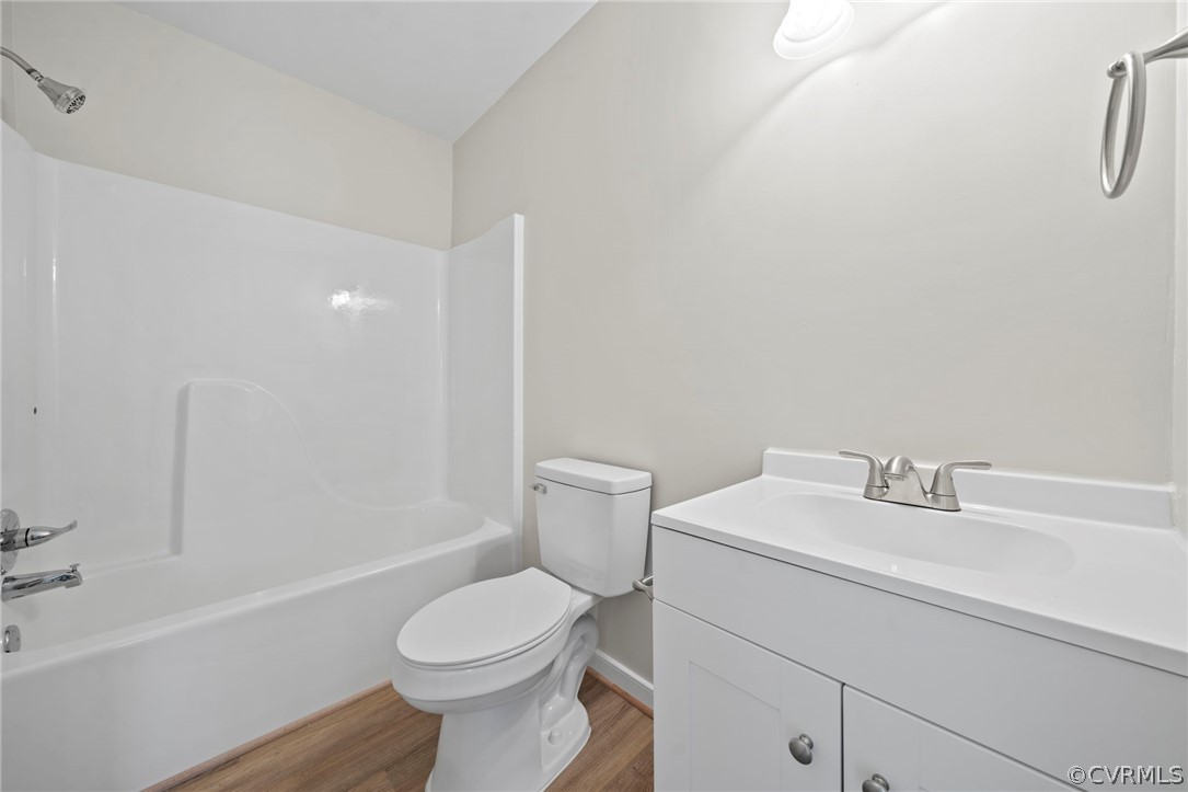 5205 Hallmark Circle Richmond, VA 23234 - Photo 11 of 36 a bathroom with a sink toilet and shower