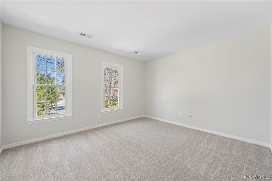 5205 Hallmark Circle Richmond, VA 23234 - Photo 12 of 36 an empty room with windows