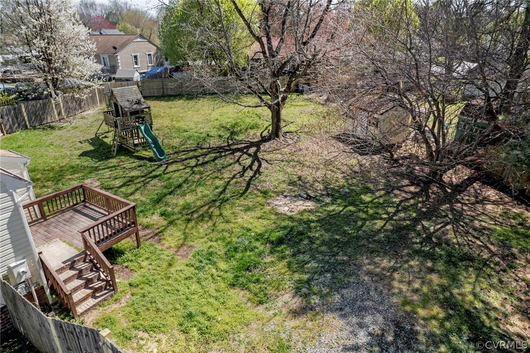 5205 Hallmark Circle Richmond, VA 23234 - Photo 26 of 36 a view of a garden with a bench