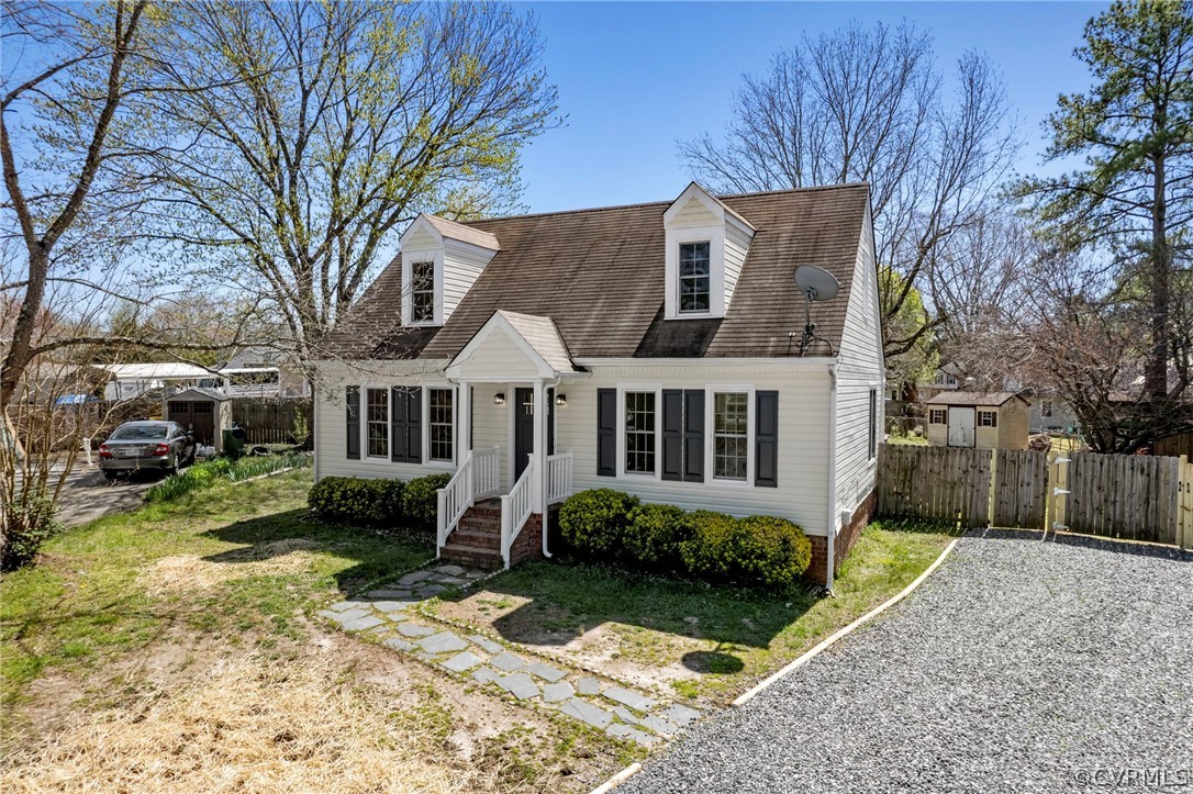 5205 Hallmark Circle Richmond, VA 23234 - Photo 27 of 36 a front view of a house with a yard and trees