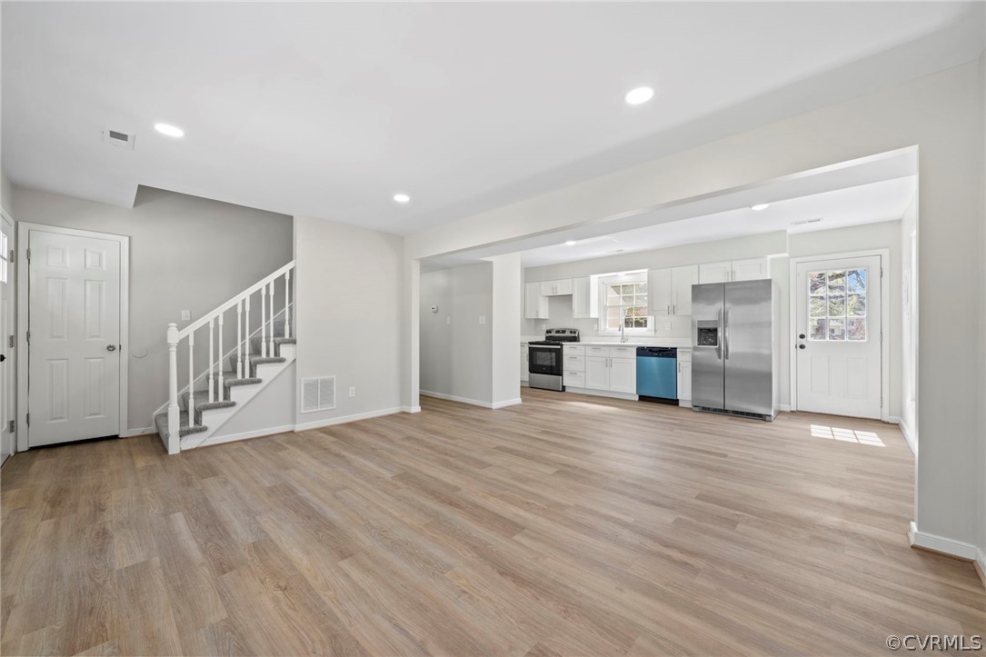 5205 Hallmark Circle Richmond, VA 23234 - Photo 4 of 36 a view of an empty room with wooden floor