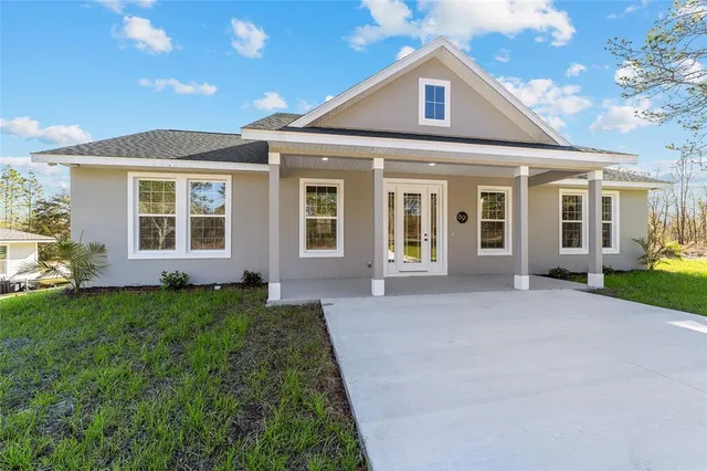 front view of a house with a yard