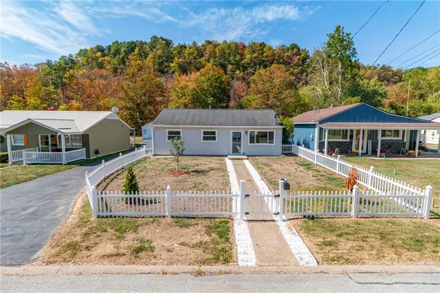 a view of swimming pool with a patio