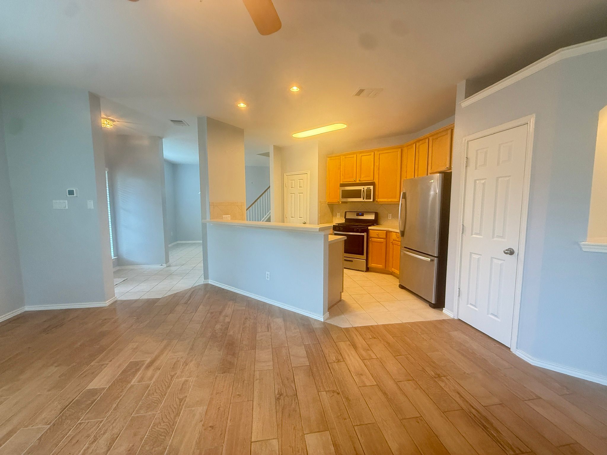 1900 Scofield Ridge Parkway, Unit 2103 Austin, TX 78727 - Photo 3 of 35 Open floor, view from family room to kitchen and dinning room.