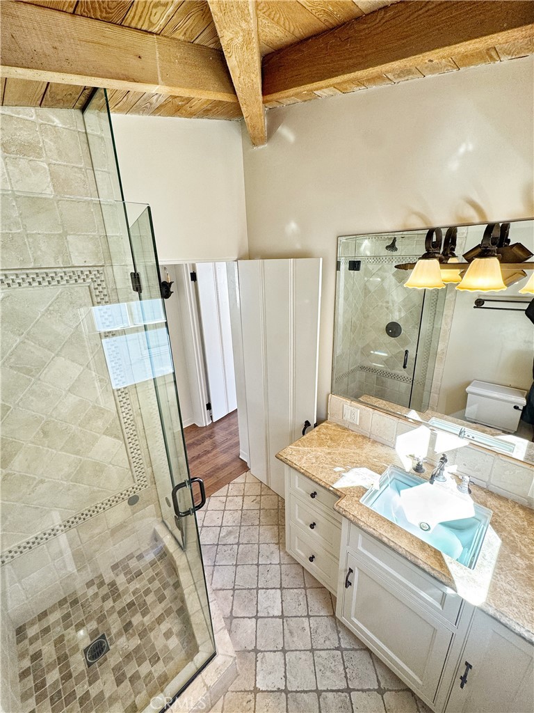 1211 West Bay Avenue Newport Beach, CA 92661 - Photo 17 of 29 a bathroom with a sink and a mirror