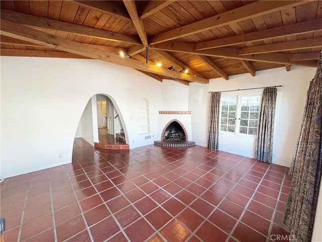 a view of a livingroom with furniture and window