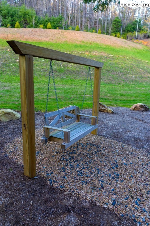 Lot 69 Angelfire Trail Deep Gap, NC 28618 - Photo 21 of 25 a backyard of a house with lots of green space