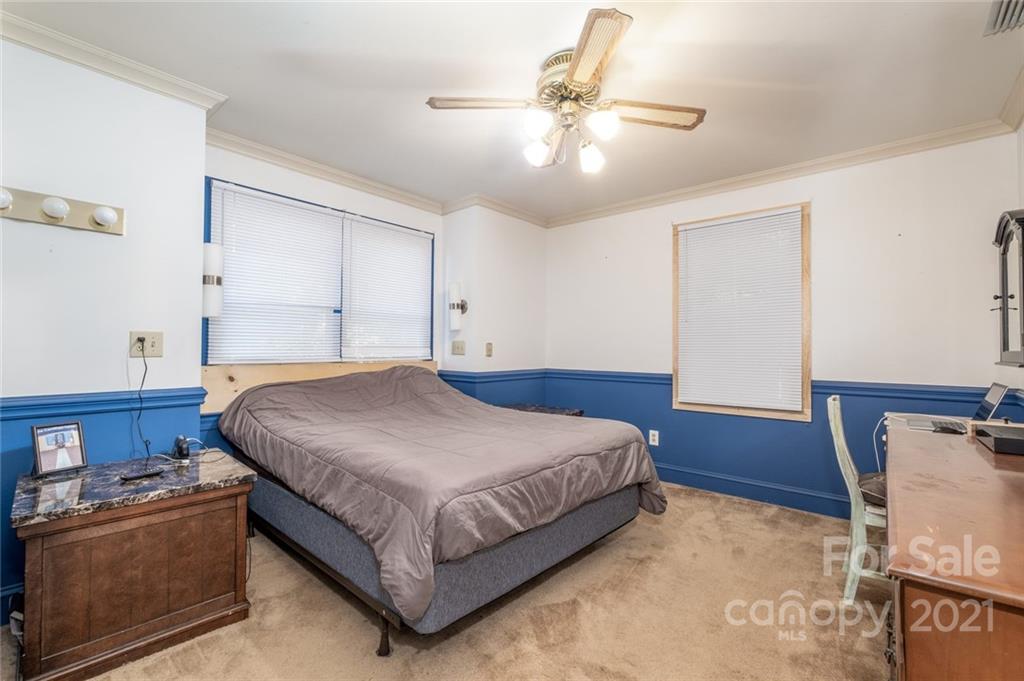 3810 Stack Road Monroe, NC 28112 - Photo 14 of 26 a bedroom with a bed and dresser