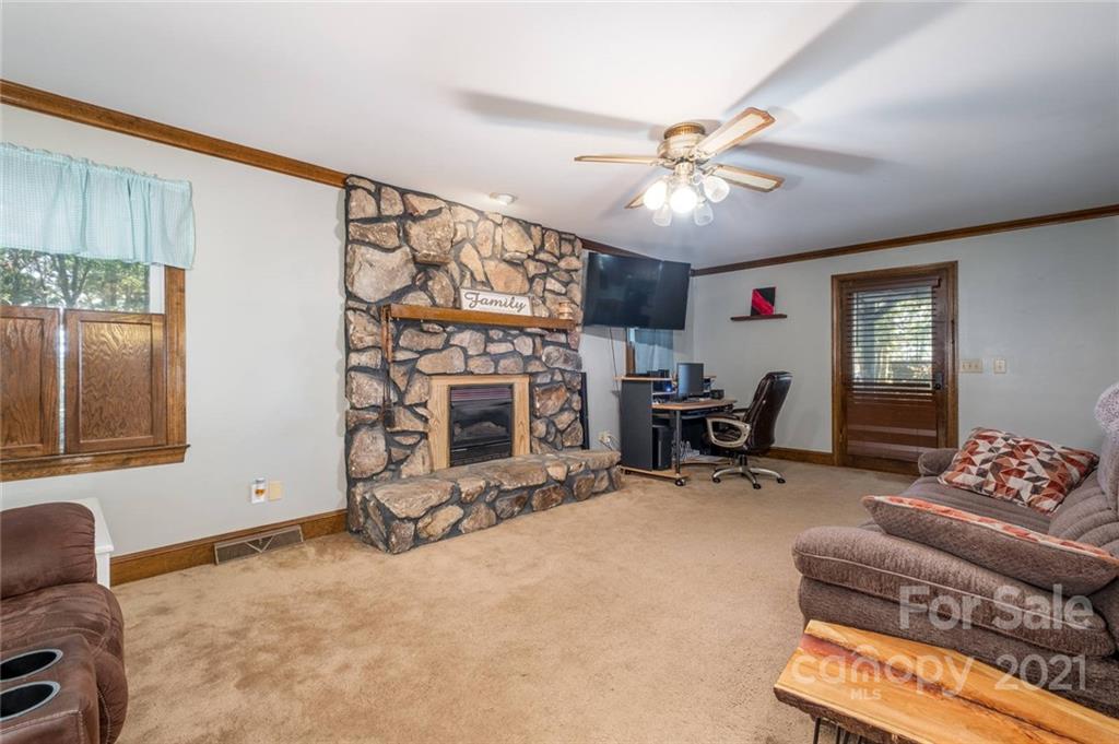 3810 Stack Road Monroe, NC 28112 - Photo 3 of 26 a living room with furniture and a fireplace
