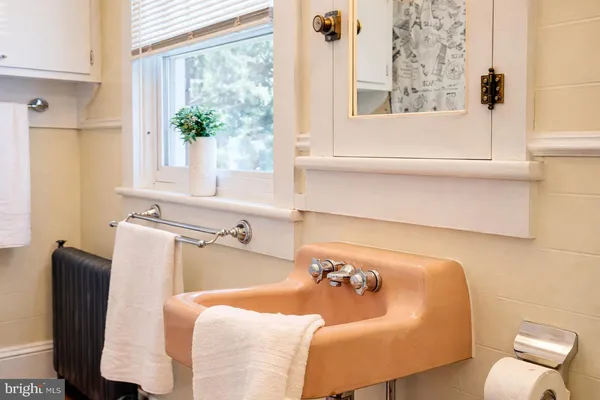 a bathroom with a sink and a bathtub