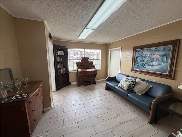 a kitchen with a sink and a stove top oven