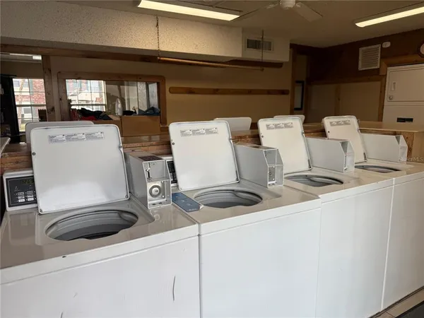 a view of kitchen sink washer and dryer