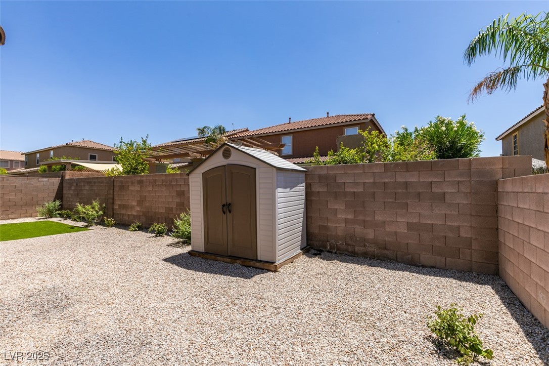 823 Wintersweet Road Henderson, NV 89015 - Photo 47 of 50 View of shed featuring a fenced backyard