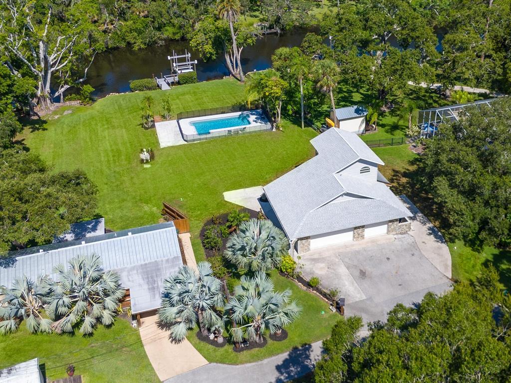 2504 Wilkinson Road Sarasota, FL 34231 - Photo 10 of 12 an aerial view of a house