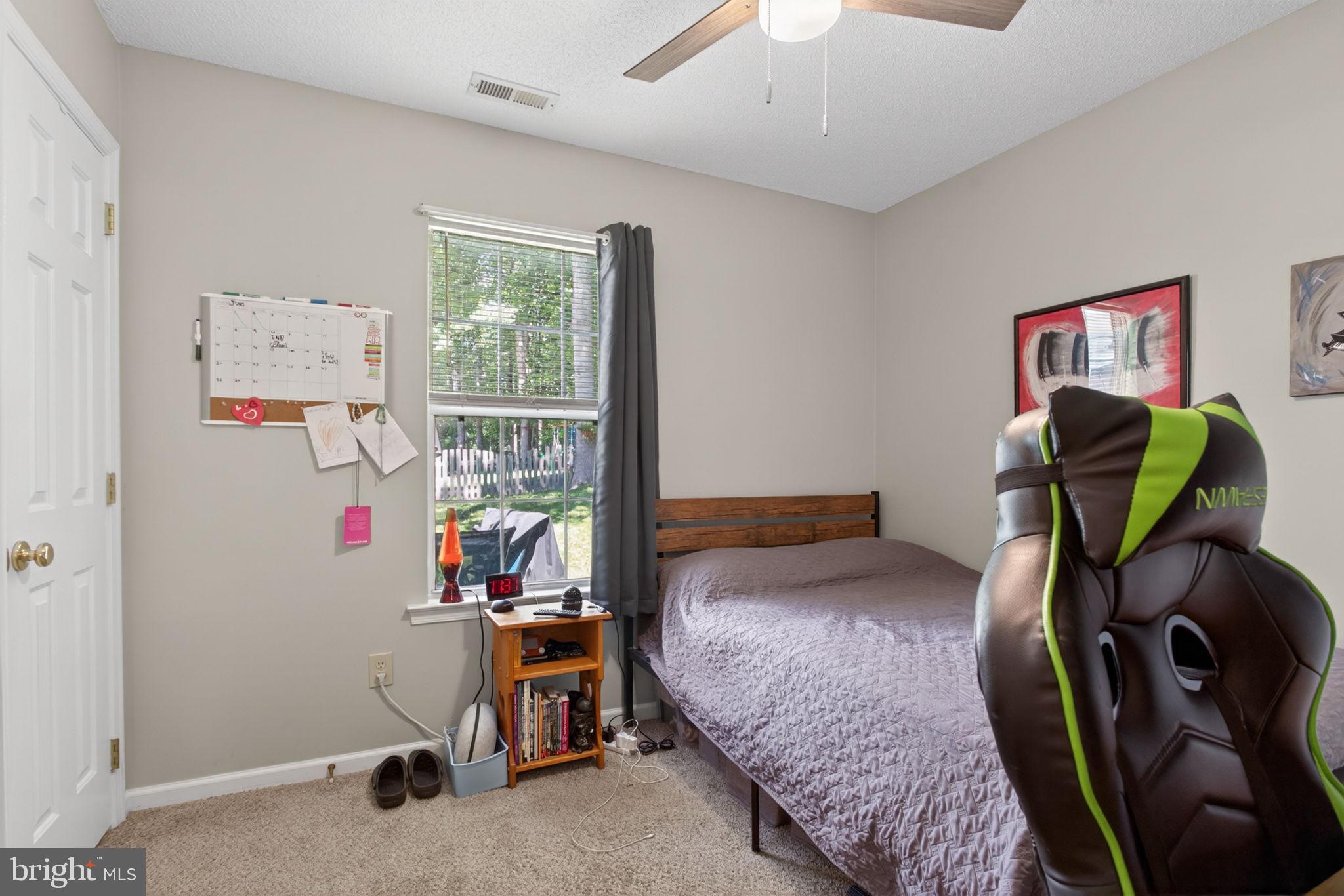 3917 Longhill Station Road Williamsburg, VA 23188 - Photo 16 of 29 Cozy bedroom with natural light.