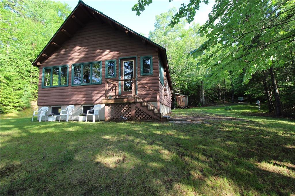 460 Birches Beach Road Oquossoc, ME 04964 - Photo 14 of 35 lakeside of cottage