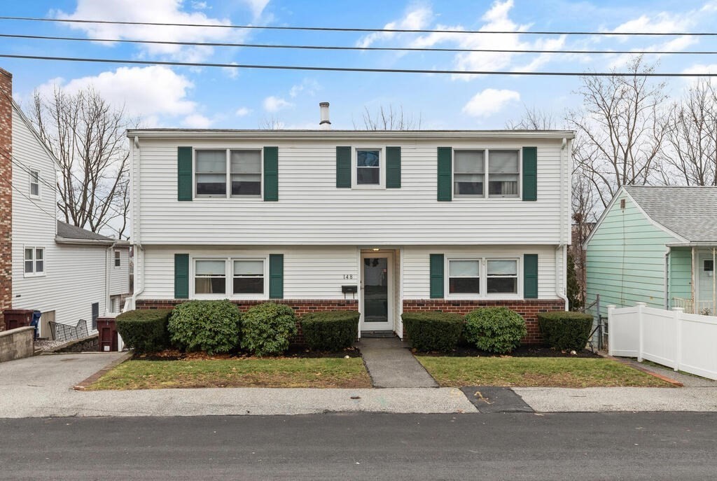 148 Ridge Road Revere, MA 02151 - Photo 2 of 31 a view of a house with a yard
