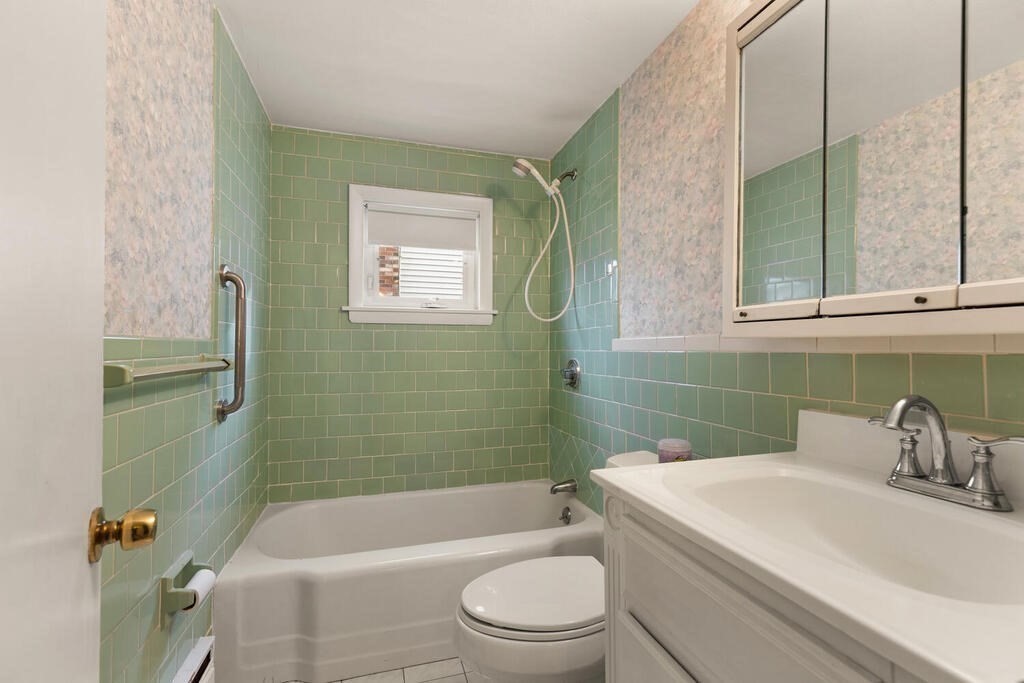 148 Ridge Road Revere, MA 02151 - Photo 22 of 31 a bathroom with a sink toilet and shower