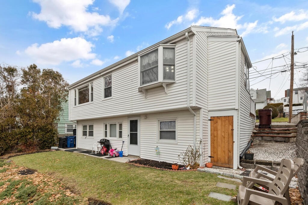 148 Ridge Road Revere, MA 02151 - Photo 28 of 31 a front view of house with yard
