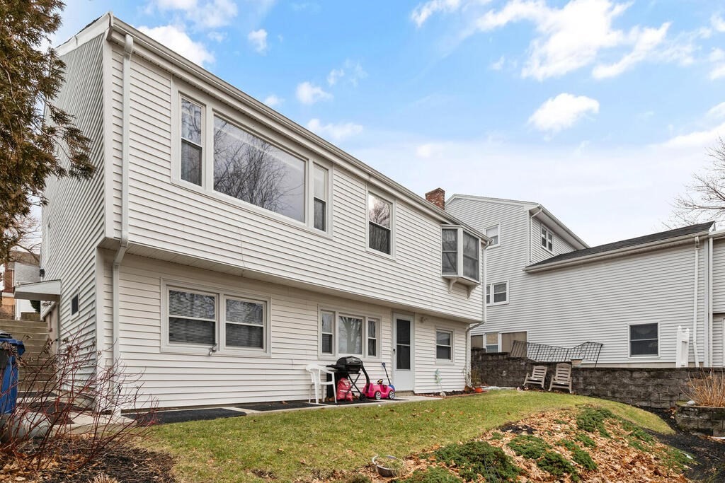 148 Ridge Road Revere, MA 02151 - Photo 29 of 31 a view of a house with a patio