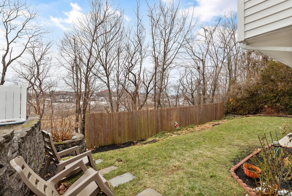 148 Ridge Road Revere, MA 02151 - Photo 30 of 31 a backyard of a house with lots of green space