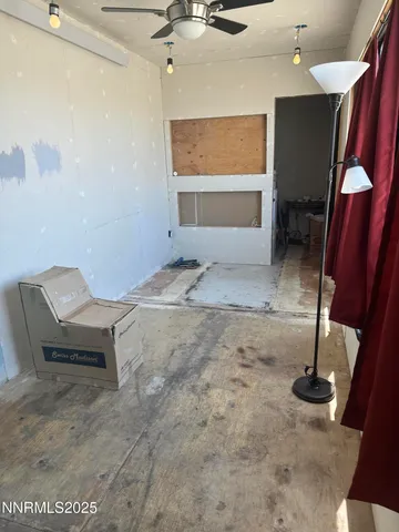 a room with a table and chairs