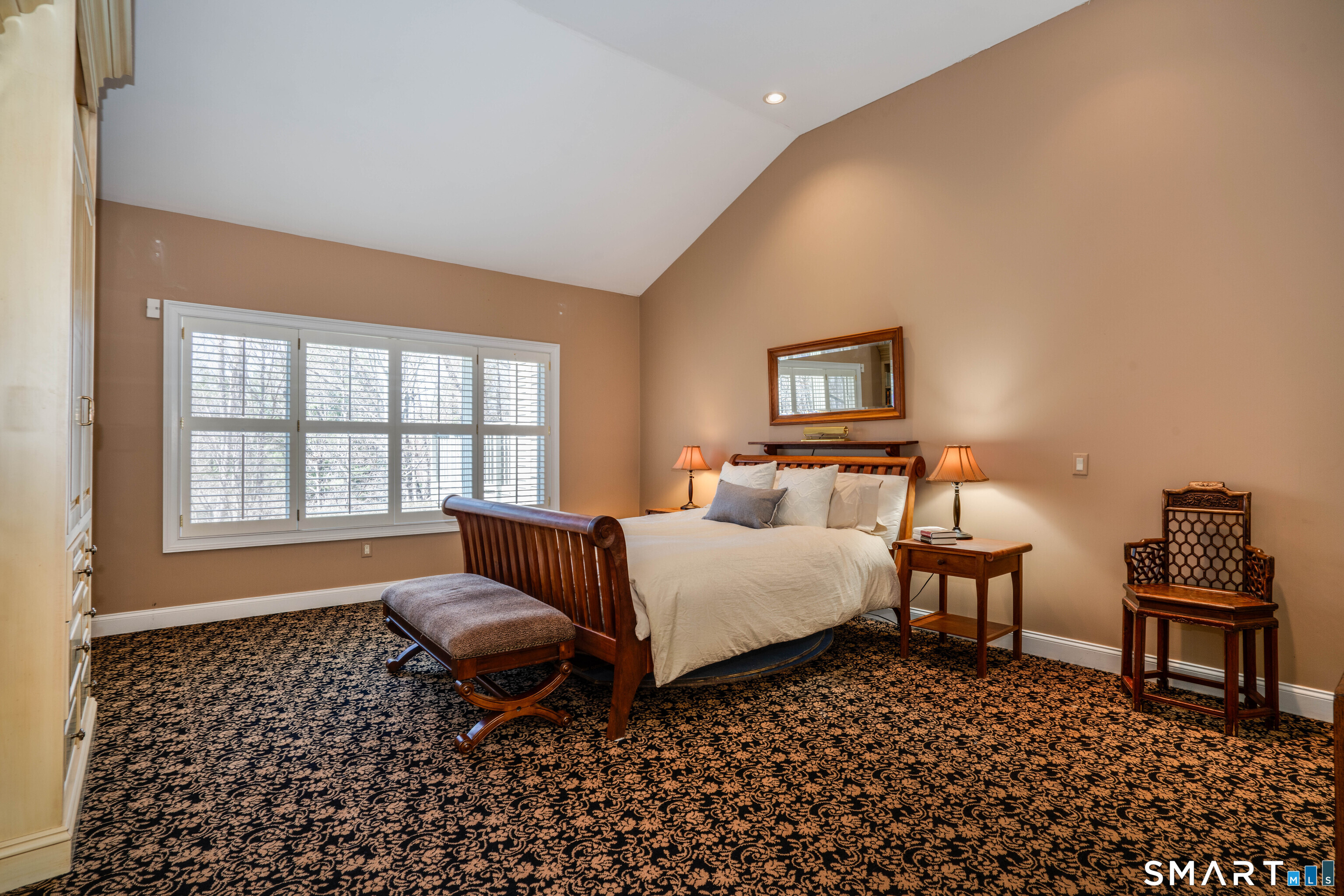 3 Shirecrest, Unit 3 Avon, CT 06001 - Photo 17 of 32 a bed room with a bed and a couch