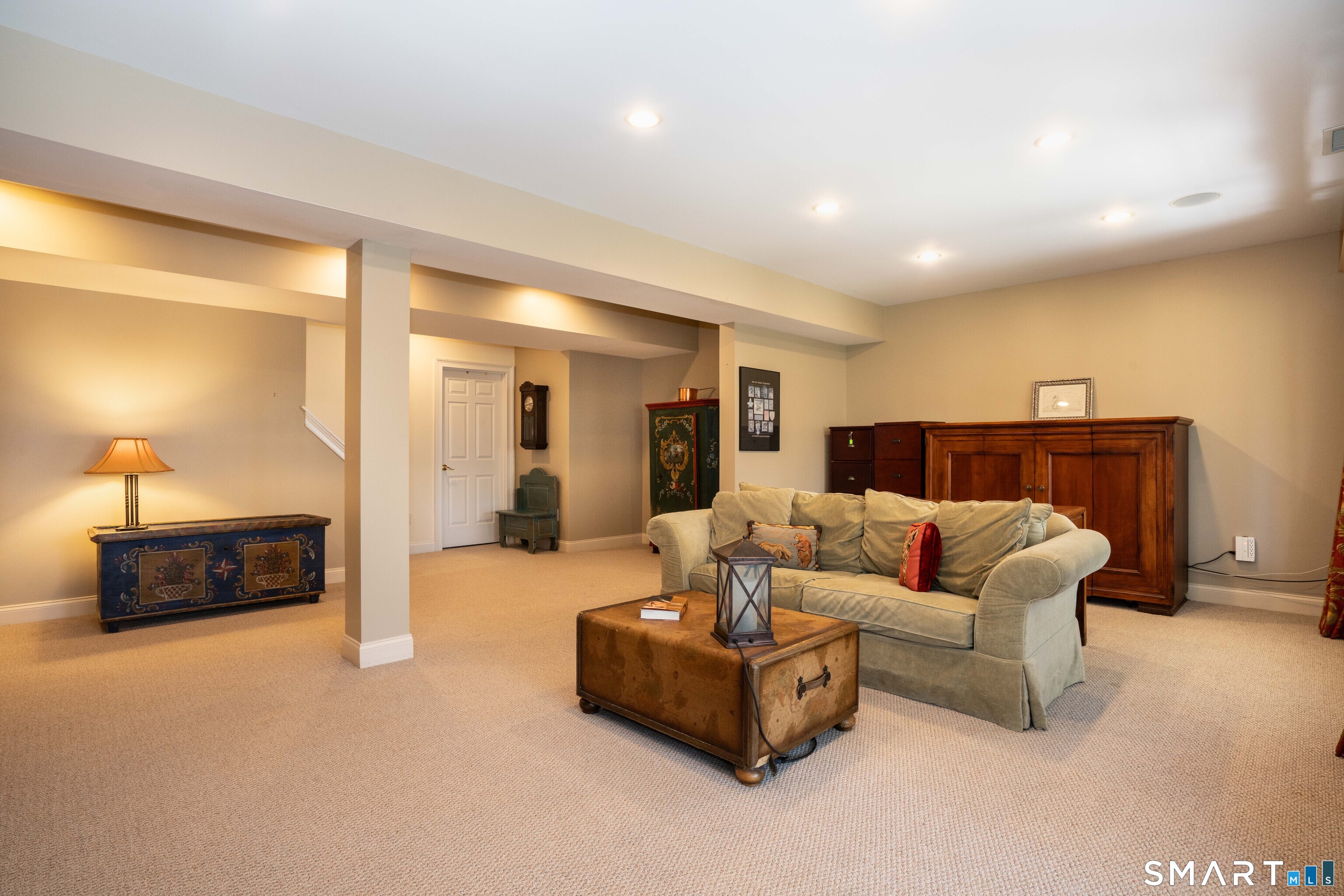 3 Shirecrest, Unit 3 Avon, CT 06001 - Photo 22 of 32 a living room with furniture and a couch