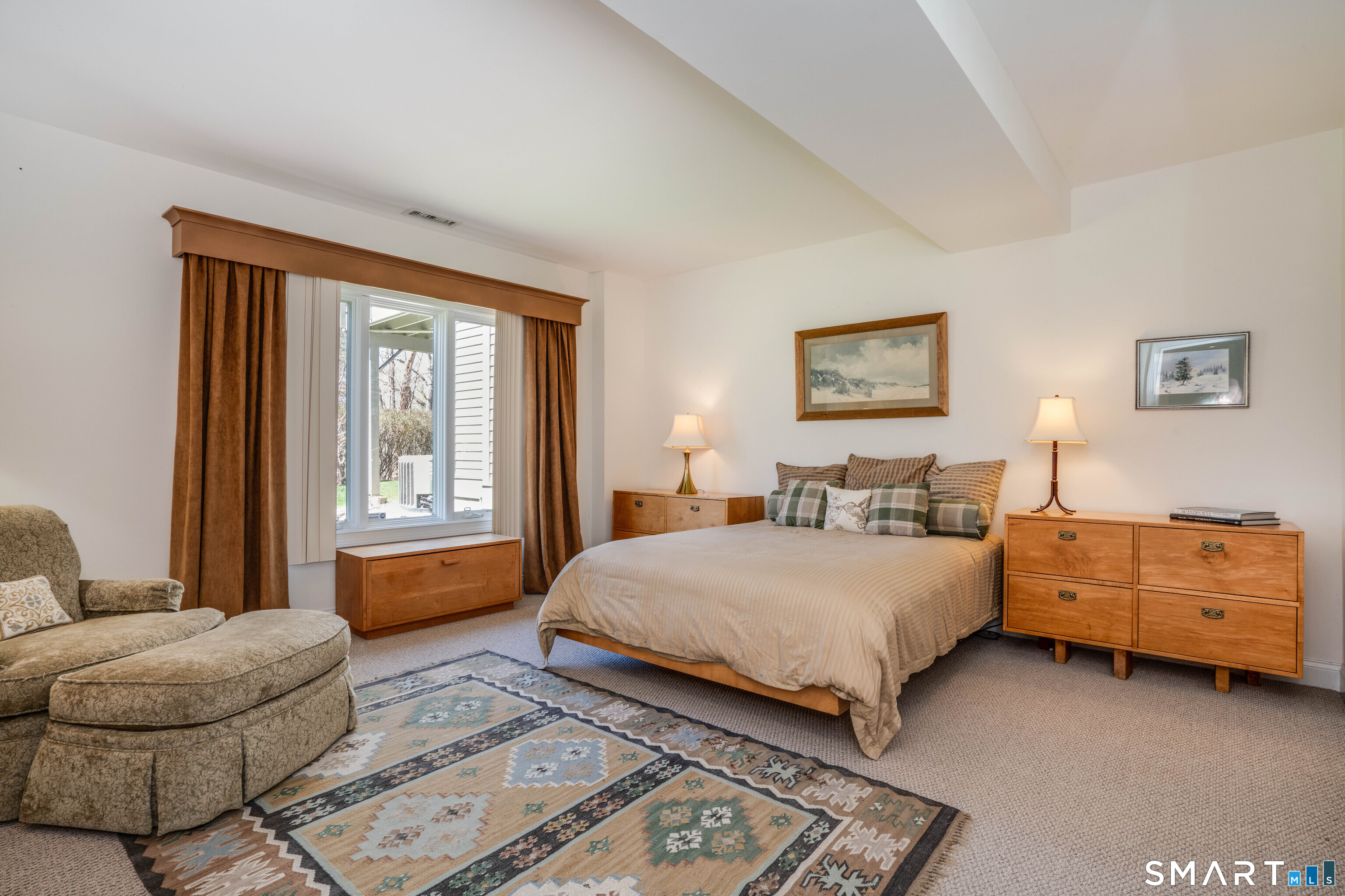 3 Shirecrest, Unit 3 Avon, CT 06001 - Photo 25 of 32 a bedroom with a bed and a couch