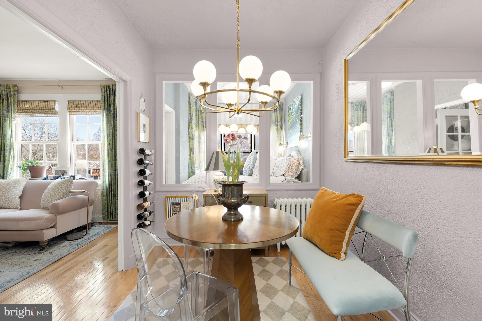 2040 Belmont Road Northwest, Unit 628 Washington, DC 20009 - Photo 10 of 19 a living room with furniture a chandelier and a chandelier