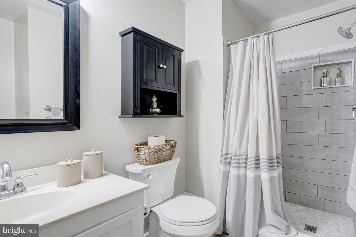 17 Braxton Drive Sterling, VA 20165 - Photo 14 of 30 Updated primary bath w/ tiled shower