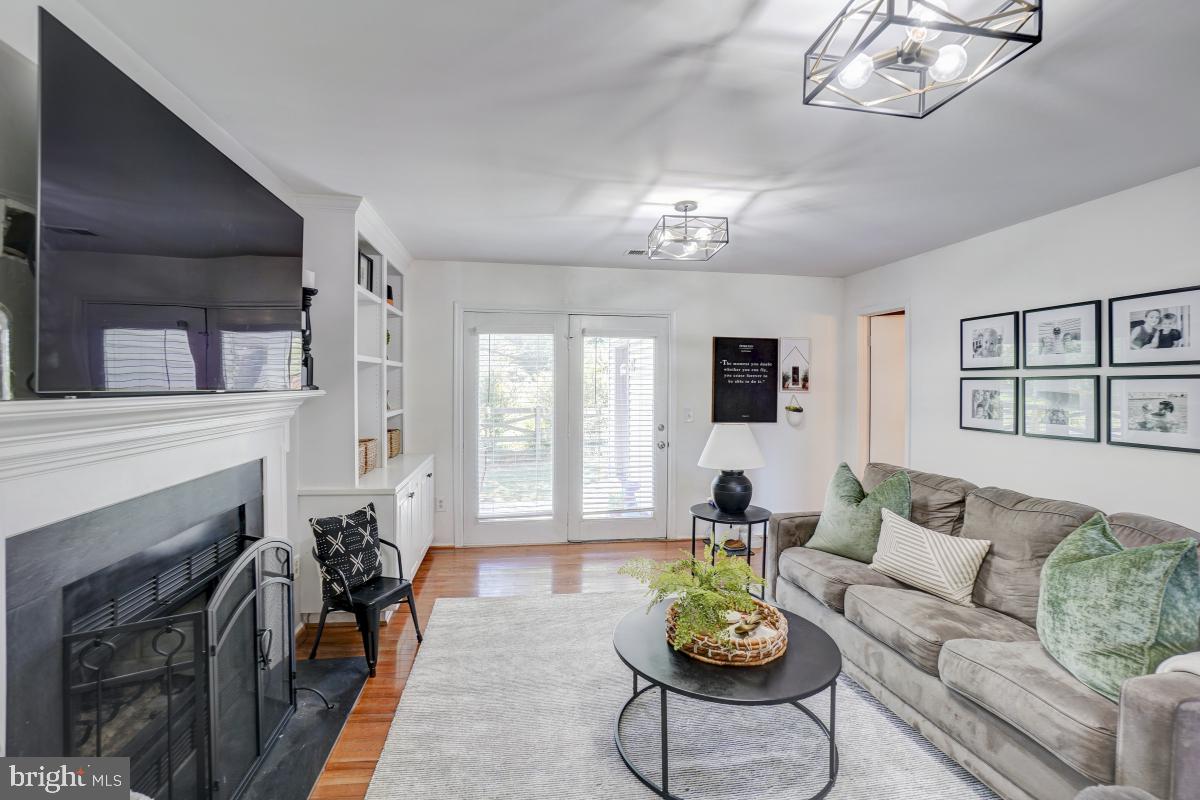 17 Braxton Drive Sterling, VA 20165 - Photo 20 of 30 Main Level Rec Room w/ Fireplace & Built-ins