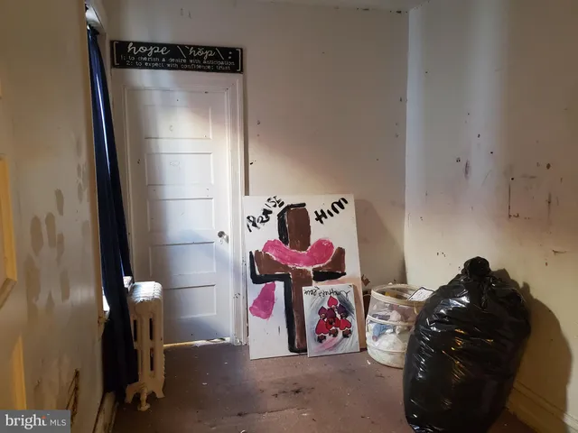 a room with furniture and a flat screen tv