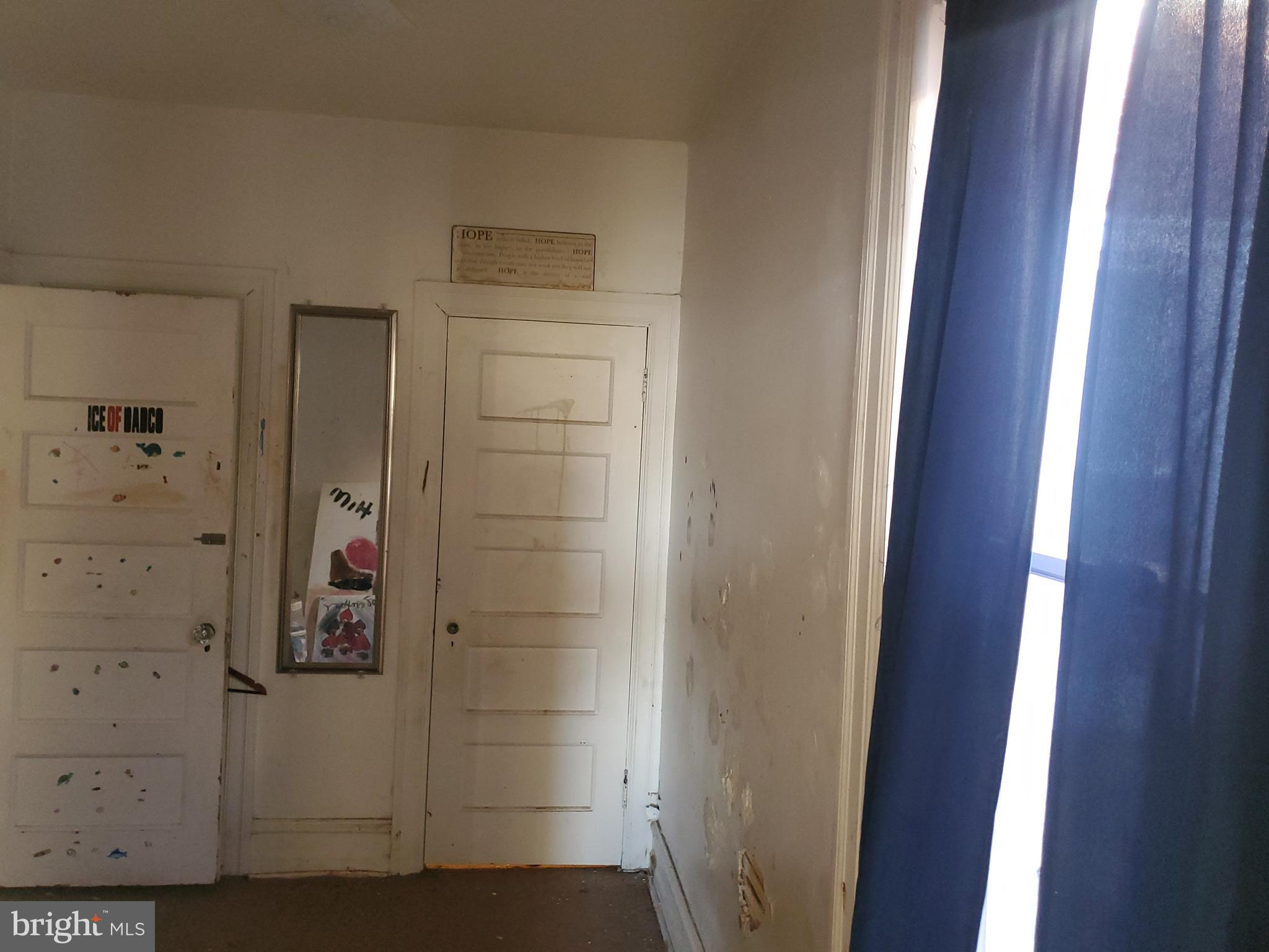 6058 Webster Street Philadelphia, PA 19143 - Photo 12 of 15 a bathroom with a shower