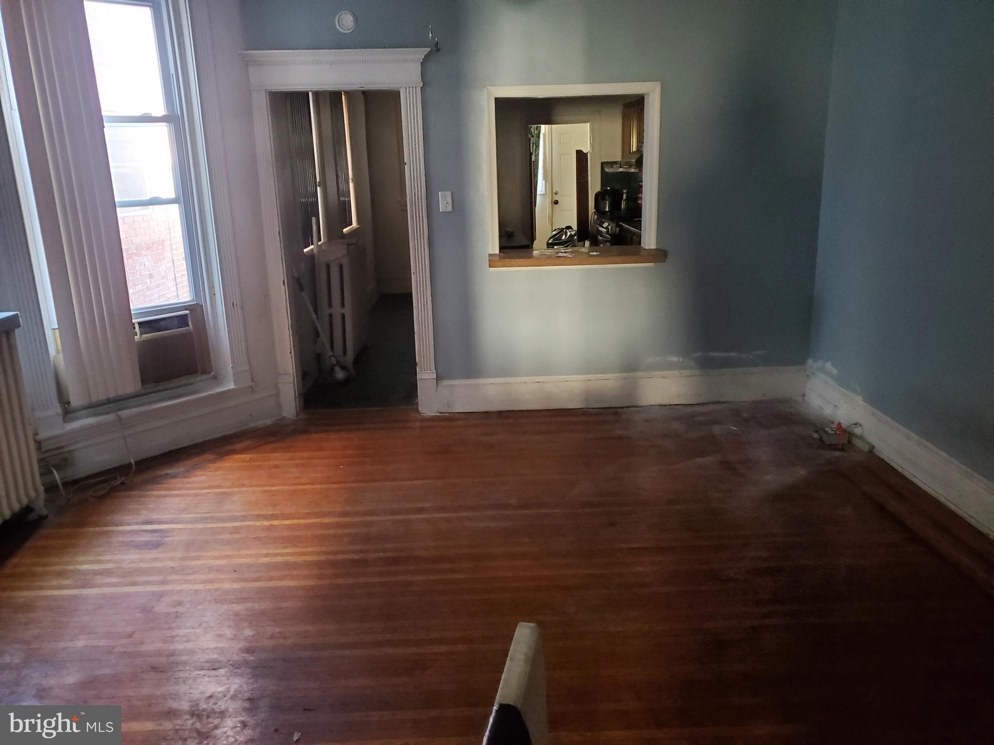 6058 Webster Street Philadelphia, PA 19143 - Photo 3 of 15 a view of wooden floor in an empty room