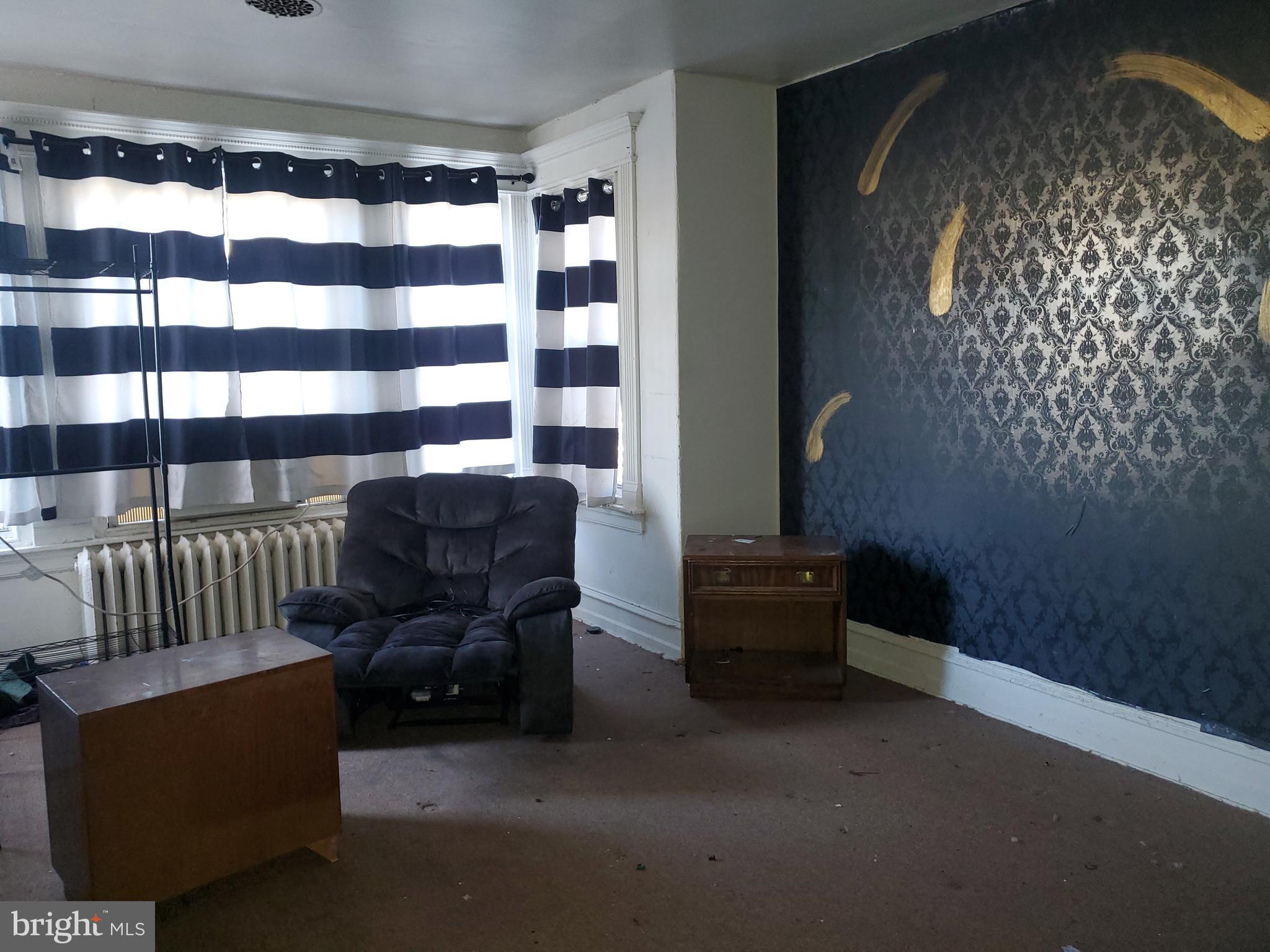 6058 Webster Street Philadelphia, PA 19143 - Photo 6 of 15 a view of livingroom with furniture