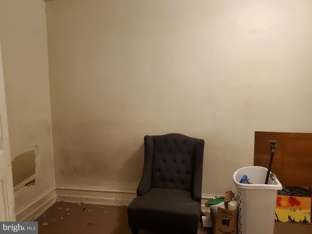 a bathroom with a granite countertop sink